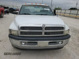 2001 Dodge Ram 3500 with VIN 1B7MC33771J257977, listed as a Copart auction lot 57947454 with 329,593 mi miles and Salvage Title. Bid and sale history available at carsss.com. Image 5.