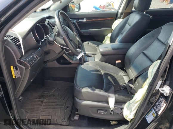 2012 Kia Sorento EX z VIN 5XYKUDA25CG305111, wystawiony jako Copart lot #54216645 z przebiegiem 111 841 mil mil oraz Szkoda całkowita • Salvage title. Historia ofert i sprzedaży dostępna na DreamBid. Obrazek 7.