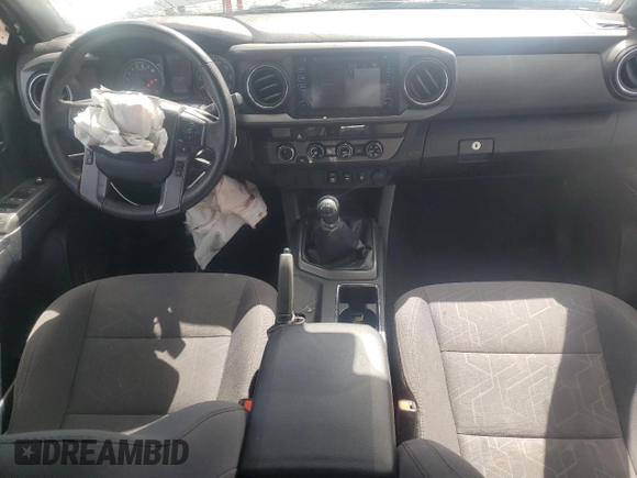 2018 Toyota Tacoma SR with VIN 5TFCZ5AN3JX128204, listed as a Copart auction lot 53970865 with 76,986 mi miles and Salvage Title. Bid and sale history available at DreamBid. Image 8.