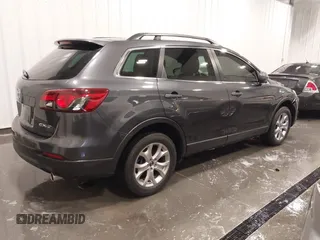 2015 Mazda CX-9 Sport with VIN JM3TB2BA1F0453620, listed as a IAAI auction lot 41330887 with 119,219 mi miles and . Bid and sale history available at carsss.com. Image 4.