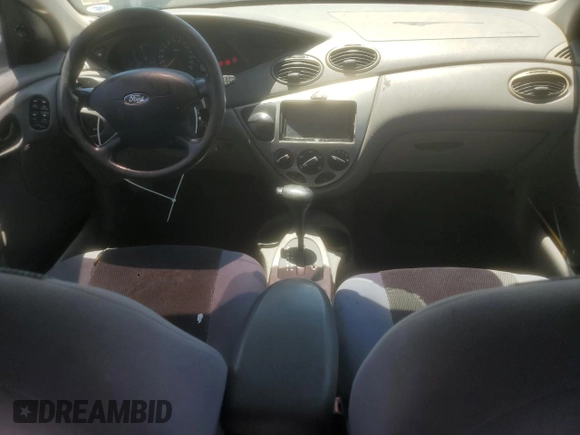 2004 Ford Focus SE with VIN 1FAFP36384W191801, listed as a Copart auction lot 63661465 with 144,226 mi miles and Salvage title. Bid and sale history available at DreamBid. Image 8.