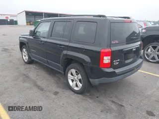 2014 Jeep Patriot Latitude with VIN 1C4NJRFB7ED713462, listed as a IAAI auction lot 42036671 with 116,276 mi miles. Bid and sale history available at carsss.com. Image 3.