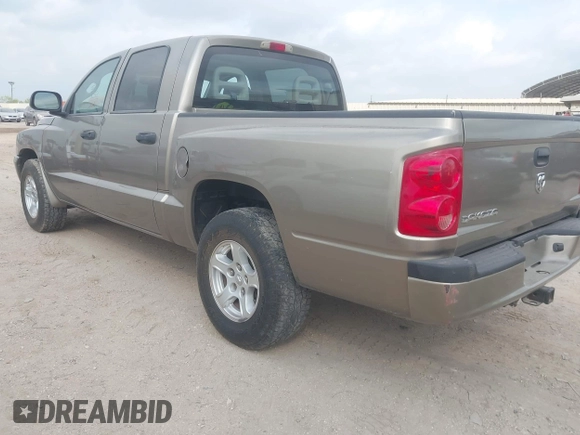2006 Dodge Dakota SLT with VIN 1D7HE48N16S703072, listed as a IAAI auction lot 42156709 with 102,919 mi miles. Bid and sale history available at carsss.com. Image 3.