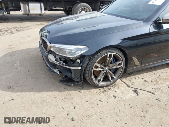 2018 BMW 5 Series M550i xDrive with VIN WBAJB9C50JB036400, listed as a IAAI auction lot 41464278 with 139,079 mi miles and . Bid and sale history available at DreamBid. Image 17.