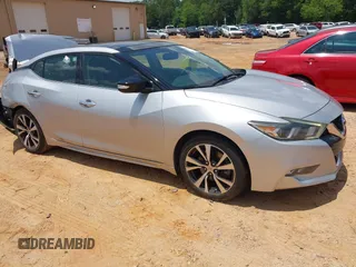 2016 Nissan Maxima SR with VIN 1N4AA6AP7GC389606, listed as a IAAI auction lot 42451614 with 114,957 mi miles and . Bid and sale history available at DreamBid. Image 1.