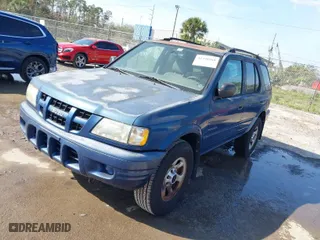 2004 Isuzu Rodeo S with VIN 4S2CK58W944317209, listed as a IAAI auction lot 41498160 with 114,764 mi miles. Bid and sale history available at carsss.com. Image 2.