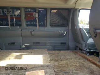 2018 GMC Savana z VIN 1GJZ7PFG7J1197205, wystawiony jako Copart lot #70311434 z przebiegiem 140 629 mil mil oraz Szkody całkowita. Historia ofert i sprzedaży dostępna na DreamBid. Obrazek 11.