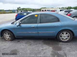 2005 Mercury Sable LS with VIN 1MEFM55S25A612965, listed as a IAAI auction lot 41988329 with 1 mi miles. Bid and sale history available at carsss.com. Image 14.