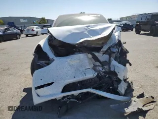 2022 Tesla Model Y Performance with VIN 7SAYGDEF9NF392197, listed as a Copart auction lot 57259105 with 43,400 mi miles and Salvage title. Bid and sale history available at DreamBid. Image 5.