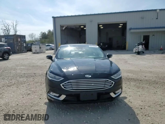 2017 Ford Fusion SE z VIN 3FA6P0H9XHR119202, wystawiony jako Copart lot #55774645 z przebiegiem 93 525 mil mil oraz Nie do naprawy • Non repairable. Historia ofert i sprzedaży dostępna na DreamBid. Obrazek 13.