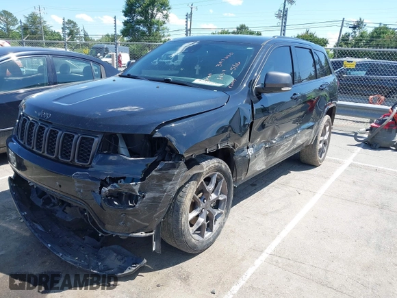 2021 Jeep Grand Cherokee Limited z VIN 1C4RJFBG4MC666557, wystawiony jako IAAI lot #42311088 z przebiegiem 126 808 mil mil oraz . Historia ofert i sprzedaży dostępna na DreamBid. Obrazek 2.