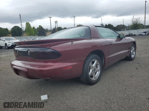 2000 Pontiac Firebird Firebird z VIN 2G2FS22K6Y2143127, wystawiony jako Copart lot #72041384 z przebiegiem 181 787 mil mil oraz Szkoda całkowita • Salvage title. Historia ofert i sprzedaży dostępna na DreamBid. Obrazek 3.