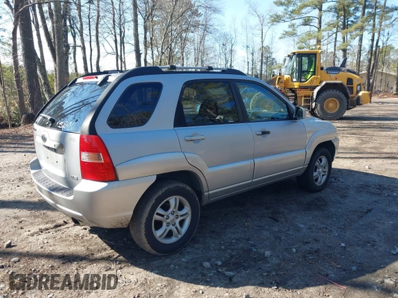 2005 Kia Sportage LX with VIN KNDJF723057130569, listed as a IAAI auction lot 41509247 with 155,777 mi miles and . Bid and sale history available at carsss.com. Image 4.