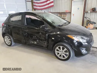 2012 Mazda Mazda2 Touring with VIN JM1DE1LY0C0147434, listed as a Copart auction lot 70712464 with 72,246 mi miles and Salvage Title. Bid and sale history available at carsss.com. Image 4.