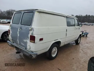 1986 Chevrolet Chevy Van z VIN 1GCEG25N0G7172290, wystawiony jako Copart lot #84010474 z przebiegiem 90 574 mil mil oraz Czysty tytuł • Clean title. Historia ofert i sprzedaży dostępna na DreamBid. Obrazek 3.