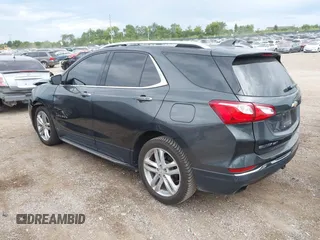 2018 Chevrolet Equinox Premier with VIN 2GNAXWEX5J6202082, listed as a IAAI auction lot 40008794 with 110,735 mi miles and . Bid and sale history available at carsss.com. Image 3.