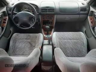 1999 Subaru Forester S with VIN JF1SF6551XH737837, listed as a Copart auction lot 81349224 with 201,012 mi miles and Salvage Title. Bid and sale history available at carsss.com. Image 8.