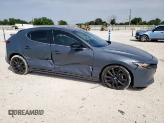 2024 Mazda 3 S Carbon Edition with VIN JM1BPBLM6R1657648, listed as a Copart auction lot 57335935 with 26,462 mi miles and Salvage title. Bid and sale history available at DreamBid. Image 4.
