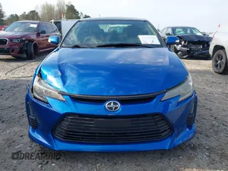 2014 Scion tC with VIN JTKJF5C72E3086001, listed as a IAAI auction lot 41721986 with 207,239 mi miles. Bid and sale history available at carsss.com. Image 12.