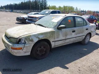 1994 Geo Prizm with VIN 1Y1SK5363RZ020392, listed as a IAAI auction lot 42023319 with 260,533 mi miles. Bid and sale history available at carsss.com. Image 2.