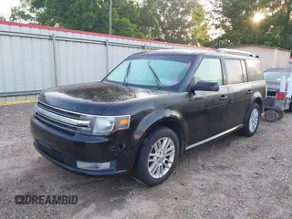 2014 Ford Flex SEL z VIN 2FMGK5C8XEBD24744, wystawiony jako IAAI lot #42365734 z przebiegiem 209 904 mil mil oraz . Historia ofert i sprzedaży dostępna na DreamBid. Obrazek 2.