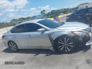 2017 Nissan Altima SV with VIN 1N4AL3AP2HC164553, listed as a IAAI auction lot 42215405 with 117,736 mi miles and . Bid and sale history available at DreamBid. Image 13.