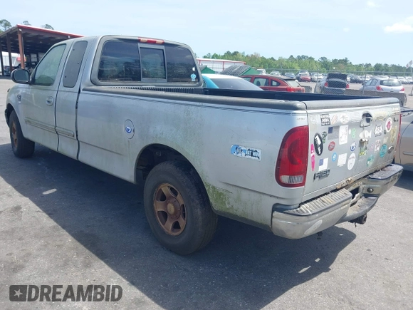 2002 Ford F-150 XL with VIN 1FTRX17W22NA55784, listed as a IAAI auction lot 41958686 with 278,064 mi miles. Bid and sale history available at carsss.com. Image 3.