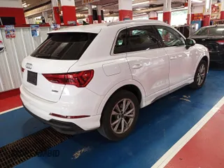 2023 Audi Q3 S line Premium with VIN WA1DECF35P1112975, listed as a IAAI auction lot 42793191 with 49,773 mi miles and . Bid and sale history available at DreamBid. Image 4.