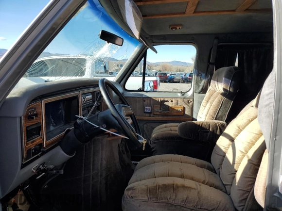 1988 Ford Econoline Cargo with VIN 1FDEE14H0JHC01117, listed as a Copart auction lot 84187634 with 74,931 mi miles and Clean Title. Bid and sale history available at DreamBid. Image 7.