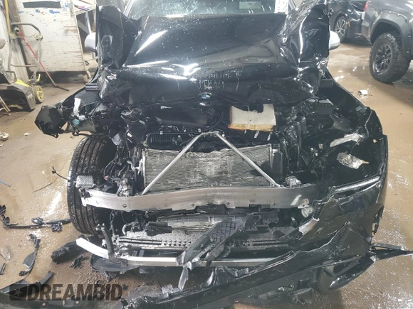 2023 BMW X1 xDrive28i with VIN WBX73EF08P5X85250, listed as a Copart auction lot 50158565 with 7,312 mi miles and Salvage Title. Bid and sale history available at DreamBid. Image 11.