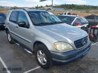 1999 Mercedes-Benz M-Class with VIN 4JGAB54E6XA133802, listed as a IAAI auction lot 41685413 with 97,875 mi miles. Bid and sale history available at carsss.com. Image 1.
