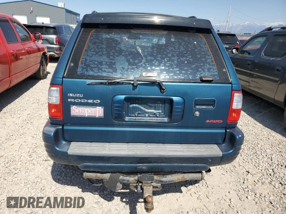 2001 Isuzu Rodeo S z VIN 4S2DM58W014344342, wystawiony jako Copart lot #60161365 z przebiegiem Nie podano mil oraz Czysty tytuł • Clean title. Historia ofert i sprzedaży dostępna na DreamBid. Obrazek 6.