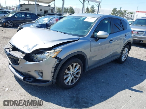 2014 Mazda CX-5 Grand Touring with VIN JM3KE2DY0E0331942, listed as a IAAI auction lot 41750533 with 163,387 mi miles. Bid and sale history available at carsss.com. Image 17.