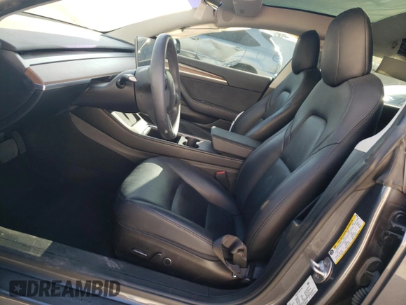 2023 Tesla Model 3 with VIN 5YJ3E1EA0PF465296, listed as a Copart auction lot 75868934 with 26,545 mi miles and Salvage Title. Bid and sale history available at DreamBid. Image 7.