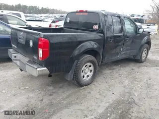 2015 Nissan Frontier SV with VIN 1N6AD0EV1FN766745, listed as a IAAI auction lot 41553521 with 107,919 mi miles. Bid and sale history available at carsss.com. Image 4.