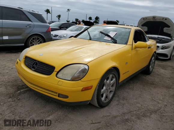 1999 Mercedes-Benz SLK-Class with VIN WDBKK47F3XF085992, listed as a Copart auction lot 76931354 with 0 mi miles and Salvage Title. Bid and sale history available at carsss.com. Image 1.