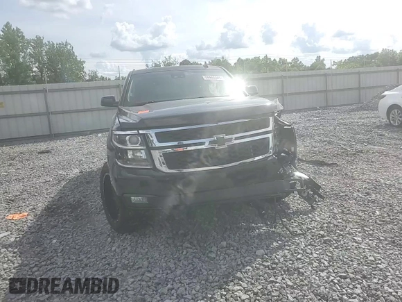 2015 Chevrolet Tahoe LT с VIN 1GNSCBKC9FR718757, выставлен на аукционе Copart как лот 59955345 с пробегом 166 146 миль миль и Списание • Salvage title. История ставок и продаж доступна на DreamBid. Изображение 14.