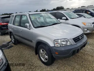 1999 Honda CR-V EX with VIN JHLRD1865XC064542, listed as a Copart auction lot 74730634 with 71,298 mi miles and Salvage Title. Bid and sale history available at carsss.com. Image 4.