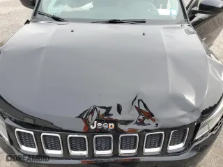 2019 Jeep Compass Latitude with VIN 3C4NJDBB8KT599275, listed as a Copart auction lot 52447025 with 104,576 mi miles and Salvage Title. Bid and sale history available at carsss.com. Image 14.