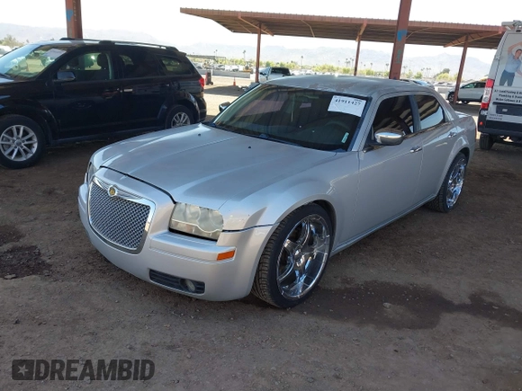 2010 Chrysler 300 Touring with VIN 2C3CA4CD6AH224777, listed as a IAAI auction lot 41911427 with 115,756 mi miles and . Bid and sale history available at DreamBid. Image 2.