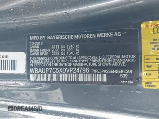 2013 BMW 1 Series 128i with VIN WBAUP7C5XDVP24796, listed as a IAAI auction lot 41807533 with 157,614 mi miles and . Bid and sale history available at carsss.com. Image 9.