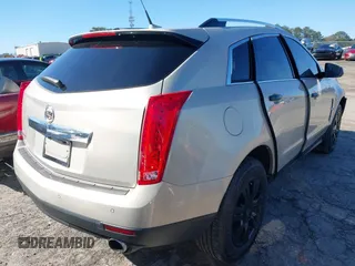 2010 Cadillac SRX Luxury Collection with VIN 3GYFNAEY0AS539075, listed as a IAAI auction lot 41736440 with 230,343 mi miles. Bid and sale history available at carsss.com. Image 4.