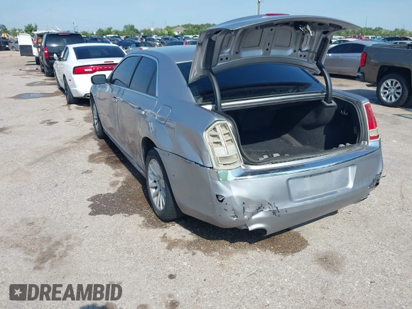 2014 Chrysler 300 z VIN 2C3CCAAG8EH161922, wystawiony jako IAAI lot #42195441 z przebiegiem 117 059 mil mil oraz . Historia ofert i sprzedaży dostępna na DreamBid. Obrazek 3.