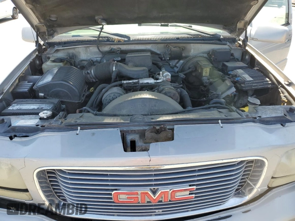1999 GMC Denali z VIN 1GKEK13R6XR914411, wystawiony jako Copart lot #56063555 z przebiegiem 231 344 mil mil oraz Szkoda całkowita • Salvage title. Historia ofert i sprzedaży dostępna na DreamBid. Obrazek 12.