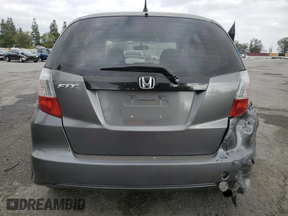 2013 Honda Fit with VIN JHMGE8H3XDC042658, listed as a Copart auction lot 89088035 with 129,132 mi miles and Salvage Title. Bid and sale history available at carsss.com. Image 6.