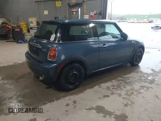2009 MINI Hardtop with VIN WMWMF33569TU73595, listed as a IAAI auction lot 42229008 with 131,793 mi miles and . Bid and sale history available at DreamBid. Image 4.
