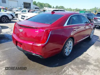 2019 Cadillac XTS Luxury z VIN 2G61M5S39K9118573, wystawiony jako IAAI lot #42014038 z przebiegiem 99 247 mil mil oraz . Historia ofert i sprzedaży dostępna na DreamBid. Obrazek 4.