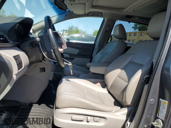 2011 Honda Odyssey Touring with VIN 5FNRL5H97BB501213, listed as a Copart auction lot 57314115 with 283,538 mi miles and Salvage title. Bid and sale history available at DreamBid. Image 7.