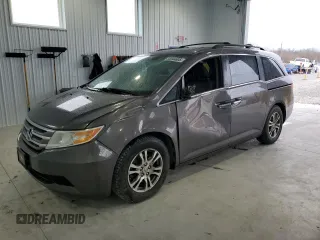 2013 Honda Odyssey EX-L with VIN 5FNRL5H60DB091685, listed as a Copart auction lot 53044605 with 242,443 mi miles and Salvage Title. Bid and sale history available at carsss.com. Image 1.