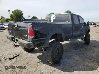 2000 Ford F-350 XL with VIN 1FTSW31FXYEB40549, listed as a Copart auction lot 46913195 with 227,408 mi miles and Salvage Title. Bid and sale history available at DreamBid. Image 4.